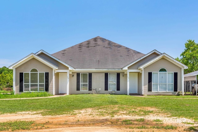 view of front facade with a front lawn