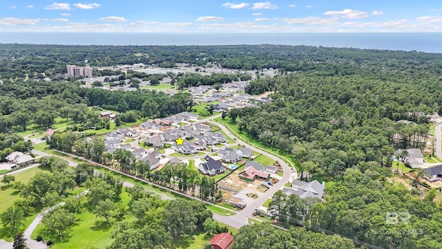 birds eye view of property featuring a residential view and a water view