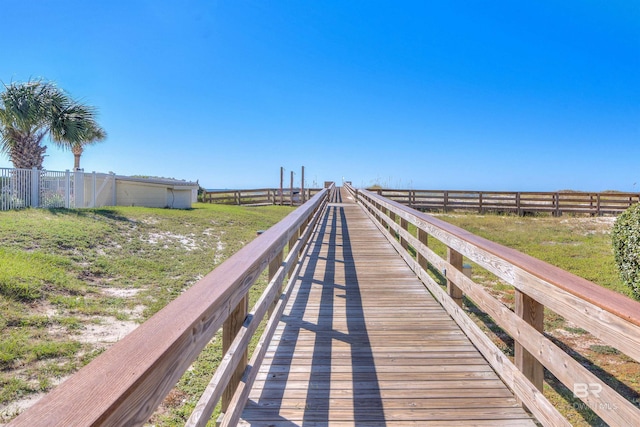 view of dock featuring fence