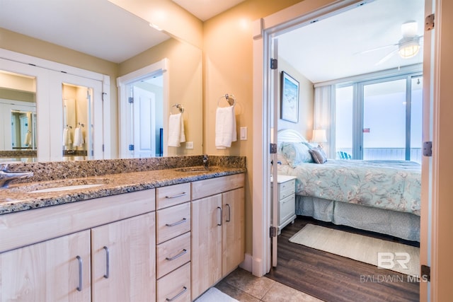 bathroom featuring vanity, tile patterned floors, and ceiling fan