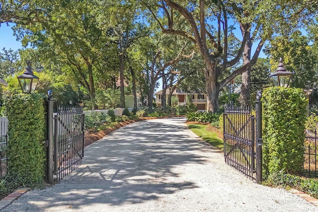 view of gate featuring fence