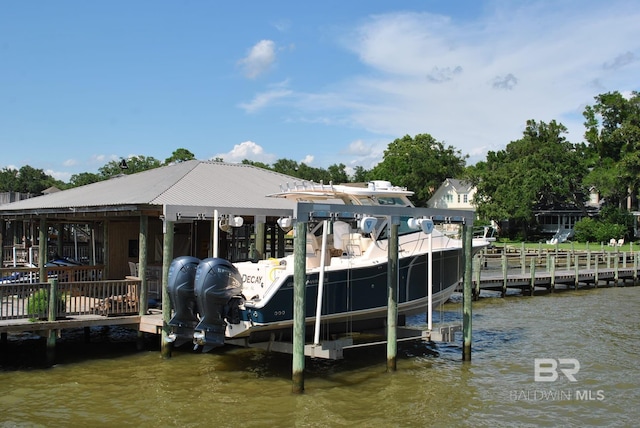 view of dock featuring a water view and boat lift