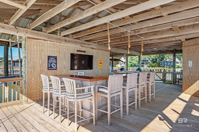 wooden terrace with outdoor dry bar