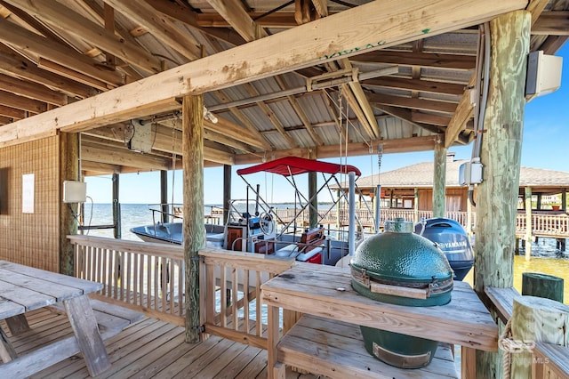 dock area featuring a water view and boat lift