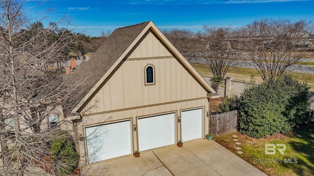 garage with fence