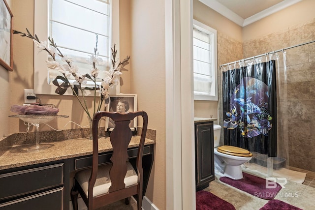 bathroom with crown molding, toilet, and a shower with shower curtain