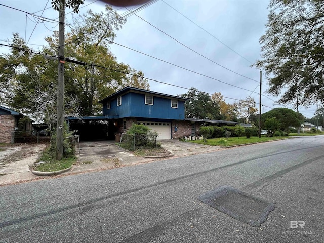 view of front of home with a garage