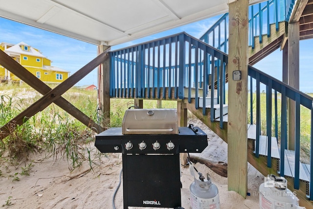 view of patio / terrace featuring stairs and grilling area