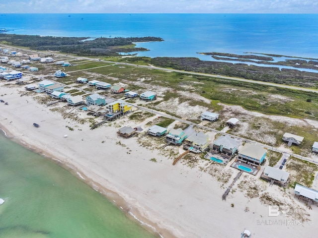 aerial view featuring a beach view and a water view