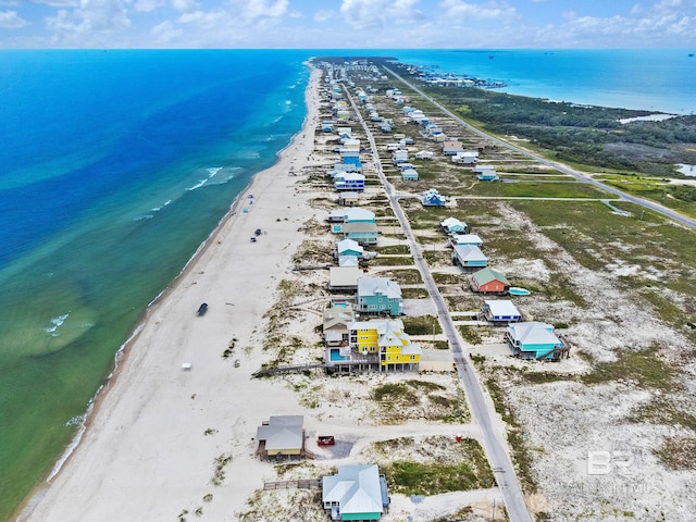 drone / aerial view with a view of the beach and a water view