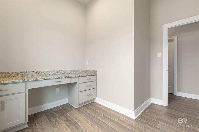 33861 Rutland Ln, Spanish Fort, AL 36527 - unfurnished office with built in study area, light wood finished floors, and baseboards