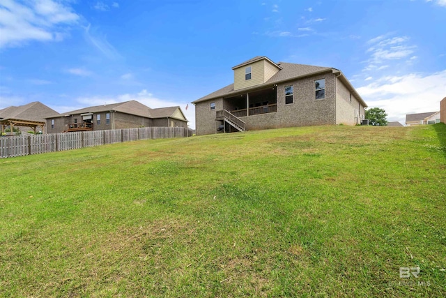 33861 Rutland Ln, Spanish Fort, AL 36527 - rear view of house with stairway and brick siding