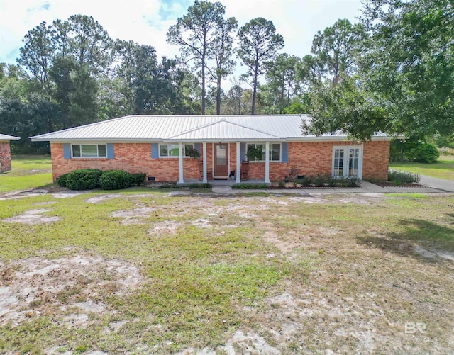 single story home featuring a front yard