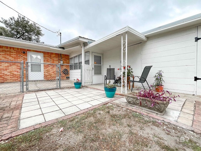 rear view of house with a patio