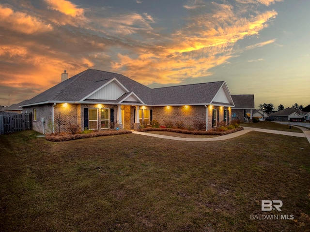 view of front of home featuring a yard