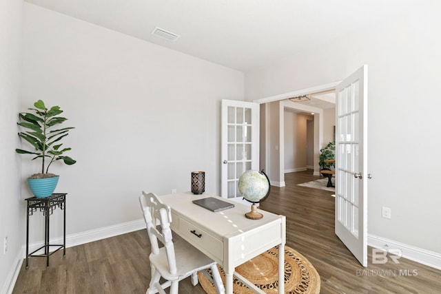 office featuring french doors and dark wood-type flooring