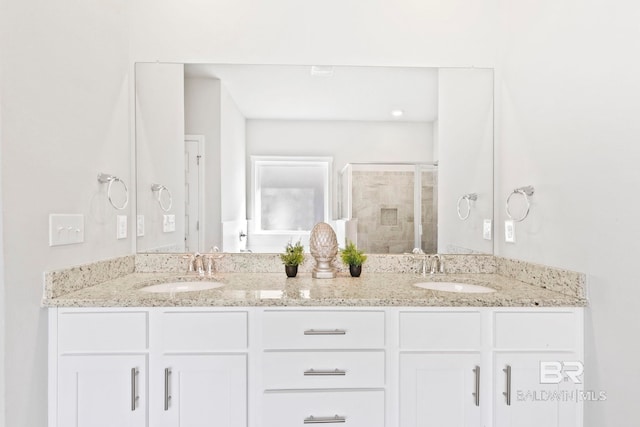 bathroom with vanity and walk in shower