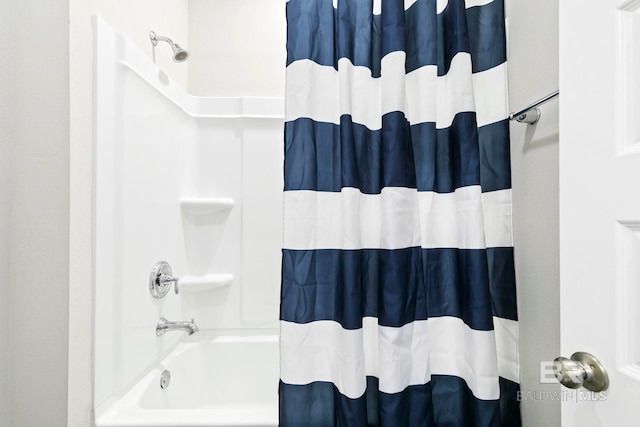 bathroom featuring shower / bath combination with curtain