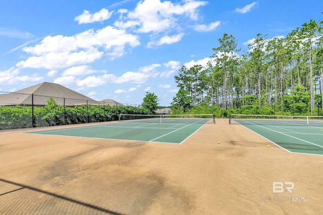 view of sport court with basketball hoop