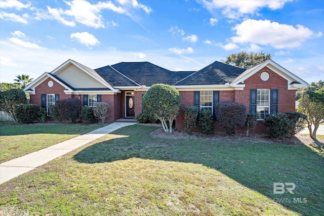 ranch-style home with a front lawn