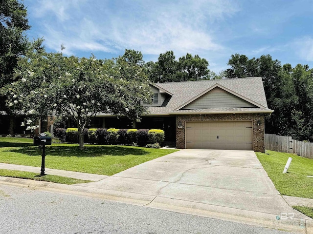 28138 Turkey Branch Dr, Daphne, AL 36526 - view of front facade with an attached garage, concrete driveway, brick siding, and roof with shingles