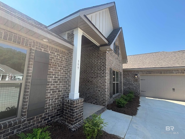 view of property exterior with a garage