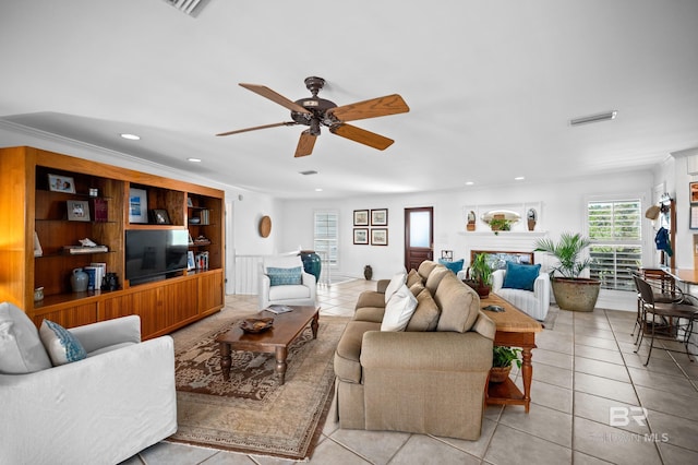 living area with ceiling fan, visible vents, recessed lighting, and light tile patterned floors