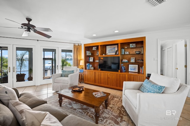 living room with light tile patterned floors, ceiling fan, ornamental molding, visible vents, and recessed lighting