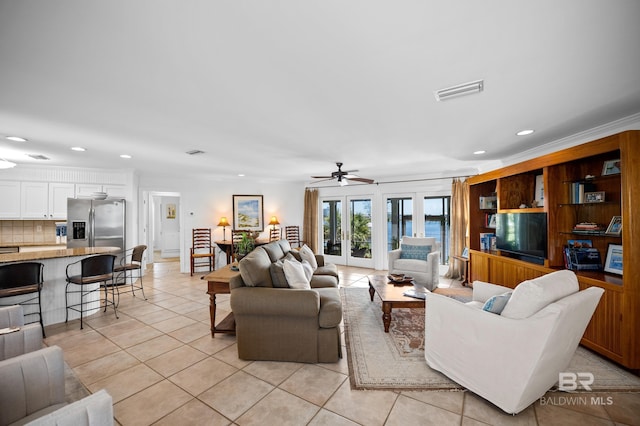 living area with ceiling fan, visible vents, recessed lighting, and light tile patterned floors