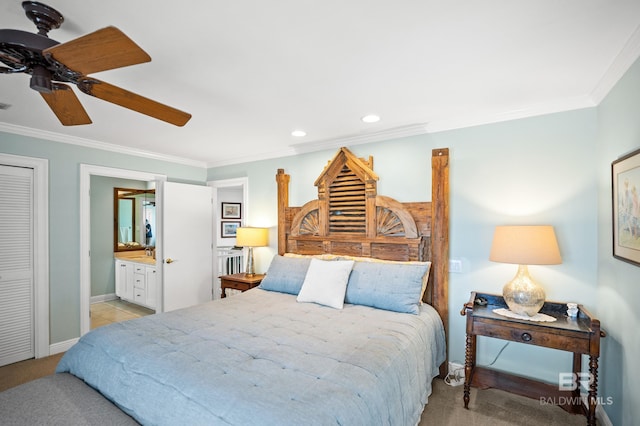 bedroom featuring light carpet, ornamental molding, ensuite bath, baseboards, and ceiling fan