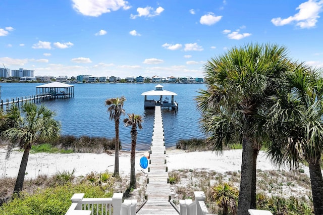 dock area featuring a gazebo and a water view