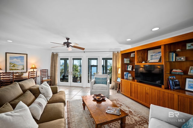 living area with recessed lighting, crown molding, a ceiling fan, and light tile patterned flooring