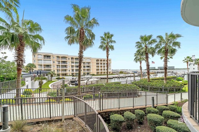 view of home's community with a water view