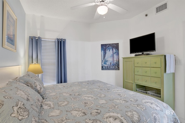 bedroom featuring ceiling fan