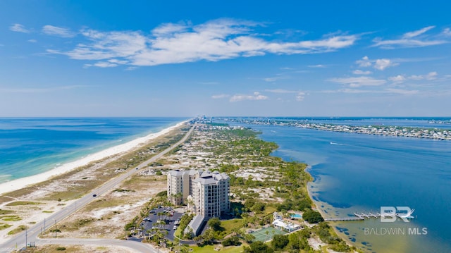 birds eye view of property featuring a water view and a view of the beach