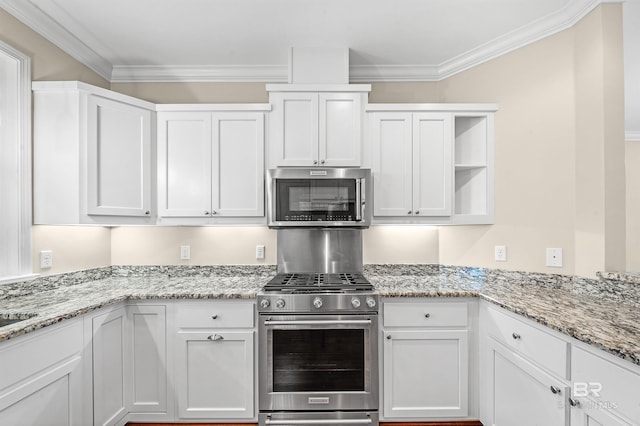 kitchen featuring appliances with stainless steel finishes, white cabinetry, open shelves, and ornamental molding