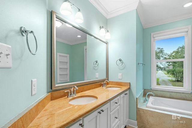 full bath featuring a garden tub, ornamental molding, double vanity, and a sink