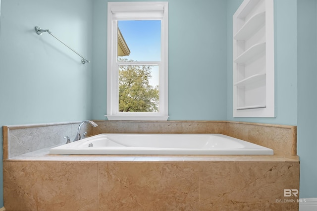 bathroom featuring a garden tub