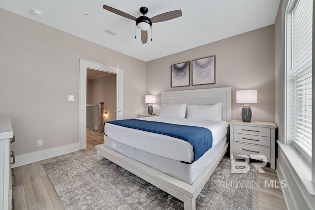 951 W Lagoon Ave, Gulf Shores, AL 36542 - bedroom featuring light wood finished floors and ceiling fan