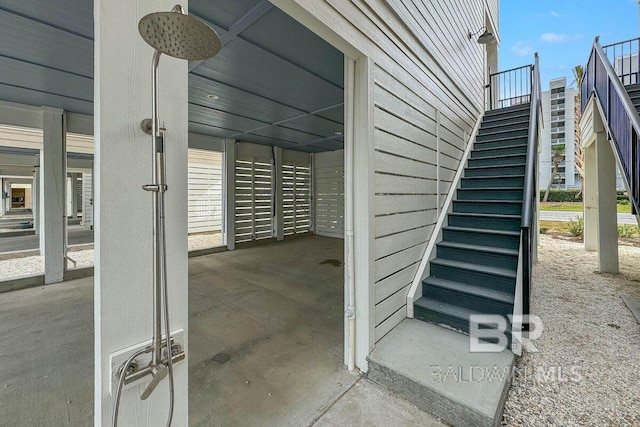 951 W Lagoon Ave, Gulf Shores, AL 36542 - view of patio featuring stairs