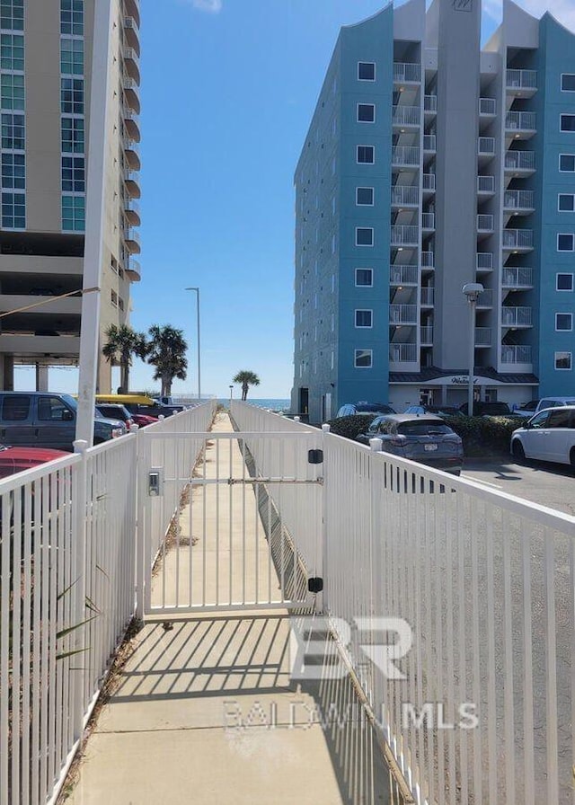 951 W Lagoon Ave, Gulf Shores, AL 36542 - view of patio featuring a gate