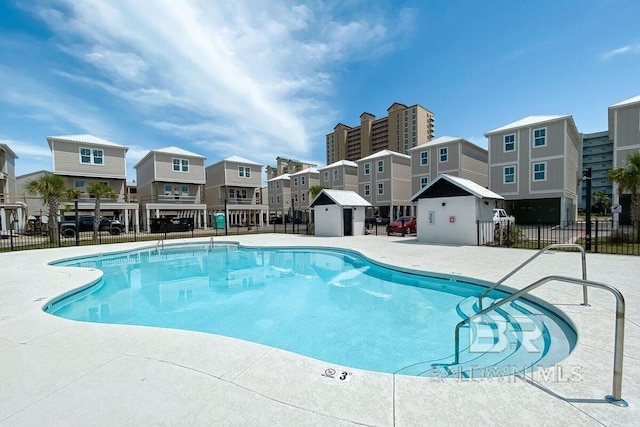 951 W Lagoon Ave, Gulf Shores, AL 36542 - community pool featuring a residential view