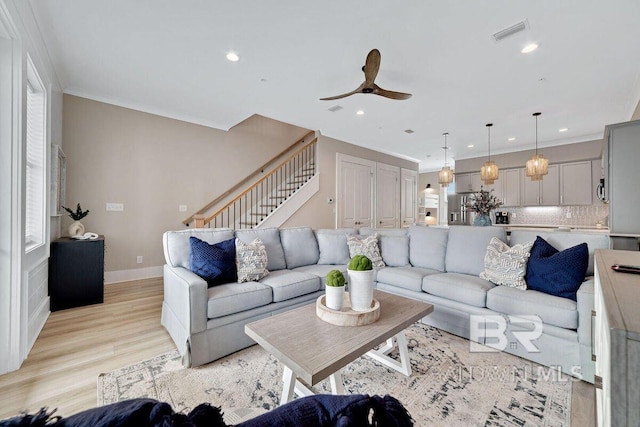 951 W Lagoon Ave, Gulf Shores, AL 36542 - living area featuring ceiling fan, recessed lighting, light wood-type flooring, stairs, and crown molding