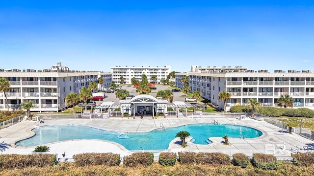 view of swimming pool featuring a patio