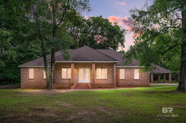 15031 Timber Ridge Dr, Loxley, AL 36551 - view of front facade with a yard and brick siding