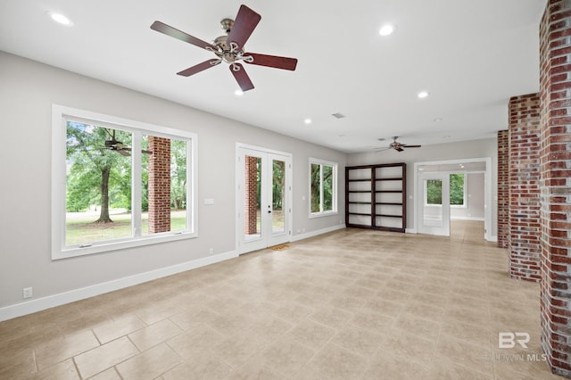 15031 Timber Ridge Dr, Loxley, AL 36551 - unfurnished living room featuring ceiling fan, baseboards, visible vents, and recessed lighting