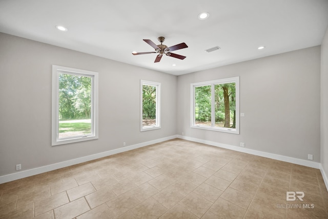 15031 Timber Ridge Dr, Loxley, AL 36551 - unfurnished room with visible vents, a wealth of natural light, a ceiling fan, and recessed lighting