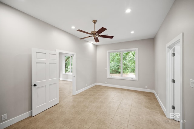 15031 Timber Ridge Dr, Loxley, AL 36551 - unfurnished room with a wealth of natural light, recessed lighting, ceiling fan, and baseboards