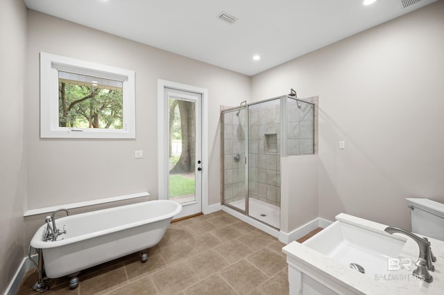 15031 Timber Ridge Dr, Loxley, AL 36551 - full bathroom with a stall shower, a freestanding tub, visible vents, and recessed lighting
