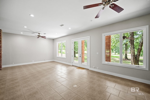15031 Timber Ridge Dr, Loxley, AL 36551 - spare room with visible vents, light tile patterned floors, baseboards, ceiling fan, and recessed lighting